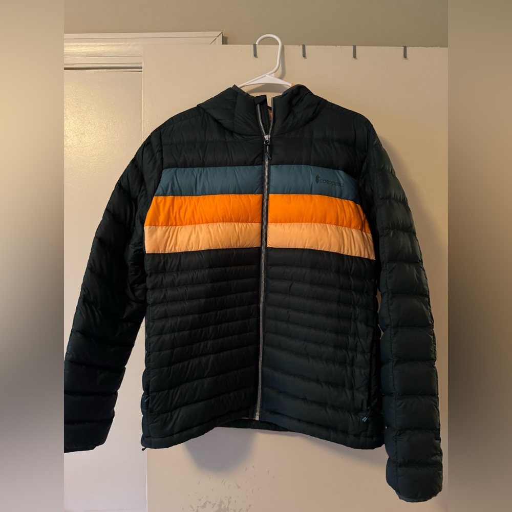 Cotopaxi Fuego Down Hooded Jacket. Green with Blue, Orange, and Cream Stripes